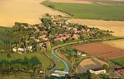 Zábrdovice od západu, uprostřed regulovaný tok Mrliny