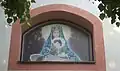 Malba nad vchodem Kaple Zjevení Panny Marie