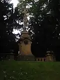 Klecany - kříž na památku Václava Beneše Třebízského.jpg