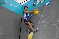 Kokoro Fudžii v topu finálového bouldru na SP 2017 v Mnichově