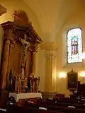 boční kaple s oltářem sv. Kříže