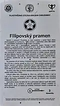 Filipovský pramen, stanoviště č. 1 – výchozí místo vlastivědné stezky od pramenné zdrojnice řeky Chrudimky (informační tabule u pramene v lesní lokalitě Humperky)