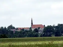 Kretingalė s evangelickým kostelem (od řeky Danė)