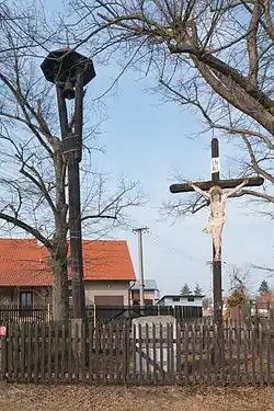 Libáň zvonička a kříž