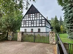 Příklad lidové architektury hrázděných domů v Libouchci