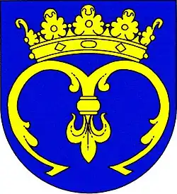 Znak obce Lodhéřov, zlatá korunovaná unciála M na modrém poli