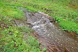 Potok v obci Lomnice