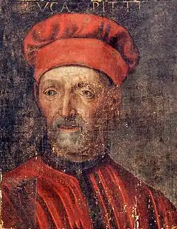 Věkem poškozený portrét staršího muže s šedou bradkou a knírem v červeném oděvu v červeném čepci