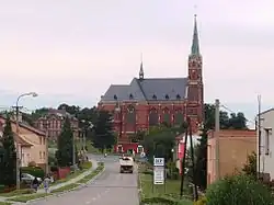 ulice Hlučínská, v pozadí kostel sv. Mikuláše