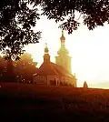 Východ Slunce za kostelem