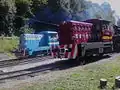 Motorové lokomotívy Janka (červená) a Danka (modrá)