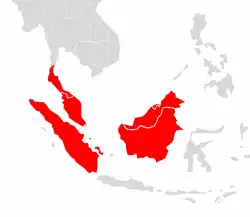 Rozšíření makaka vepřího (červeně)