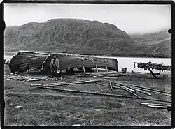 Ellisif Wessel: Man and two boats at Jakobselva