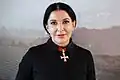 Marina Abramović s Čestným odznakem kolem krku