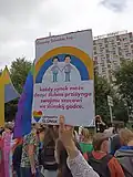 Transparent na Gay Pride v Katovicích s nápisem „Chceme Slezsko, kde každý chlapec může složit slib svému vyvolenému ve slezském jazyce.“