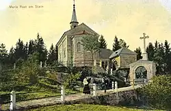 Na katastrálním území Mnichovice u Loučovic u zaniklé vsi Martínkov se nachází poutní areál Maria Rast am Stein (pohlednice z roku 1906)