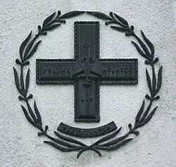 Partyzánský kříž na památníků deseti popravených 20. března 1944 ve Falejówce