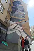 Mural Milada, dílo autorky Toy_Box na průčelí domu Milady Horákové 690/4 v Praze 7 – Holešovicích. Dílo odhaleno při příležitosti 75. let od zavraždění Milady Horákové.