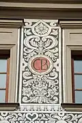 Národní dům, detail sgrafitové výzdoby domu: znak České besedy