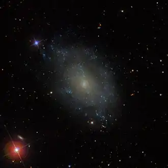 Narušená spirální galaxie NGC 5585