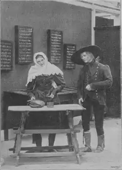 Starší pár z obce Troubsko vítá hosty chlebem a solí – model zobrazený na etnografické výstavě v Praze v roce 1895