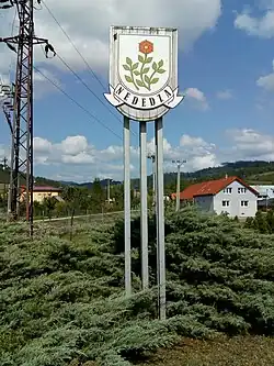 Znak obce při příjezdu do obce