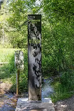 Kovový sloupek se souřadnicemi nejzápadnějšího bodu