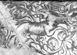 Neumannova čp. 144, vlk s ptákem v tlamě (Josef Wlha 1884, detail)