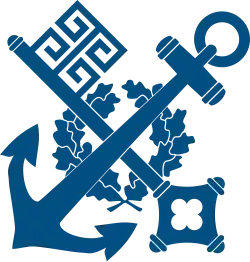 Historický znak německé rejdařské společnosti Norddeutscher Lloyd (1857-1970) z Brém: zkřížená kotva a klíč nad věncem z dubových listů v modrém poli na bílém podkladě. Ta si objednala stavbu lodi Bülow