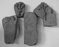 Románský tympanon z hradního kostela Jana Křtitele