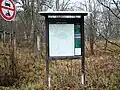Informační tabule u vjezdu do obory