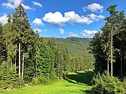 Výhled ze sjezdovky na Obrovci