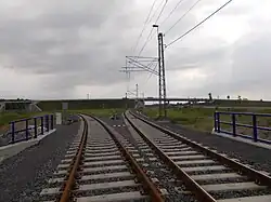 Odbočka na nově postaveném úseku k letišti Mošnov. Doleva je směr na Příbor, doprava na Studénku.