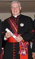 Kardinál Marc Ouellet s insigniemi řádu