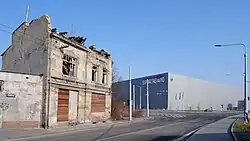 Pozůstatky původní zástavby v ulici Žižkova a nová průmyslová zóna