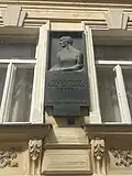 pamětní deska Elišky Krásnohorské na domě čp. 169