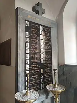 Pamětní deska obětem 2. světové války se jménem biskupa Gorazda v kostele svaté Ludmily ve Chvalech v Horních Počernicích