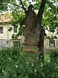 Panenské Břežany, socha svatého Jana Nepomuckého.jpg
