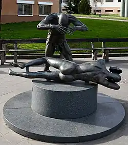 Fotograf a model, 1995, bronz, ÚVN Praha
