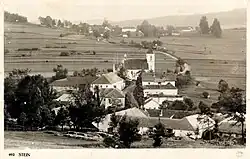 Lštín (v pozadí na návrší), v popředí Polná