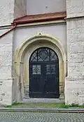 Portál severní předsíně od K. Hilberta