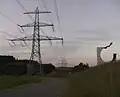 Elektrické vedení o napětí 380 kV nedaleko Waidhausu, první stožár je v Německu, zbylé jsou již na území ČR