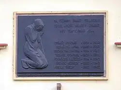 Pamětní deska rodiny Vosmíkových na domě, kde bývalo řeznictví - Zenklova 291/113, Praha 8 - Libeň