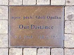 Pamětní kámen na rohu Václavské a Resslovy ulice v Praze, kde leželo jeho tělo po boji v kostele