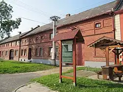 Informační tabule před typickými hanáckými statky