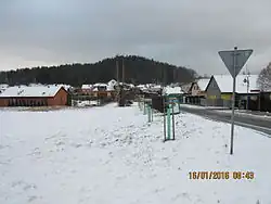 Pohled na Rasovu hůrku a část čtvrti Svárov z ulice Českých bratří