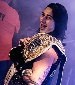 Rhea Ripley s titulem v roce 2024