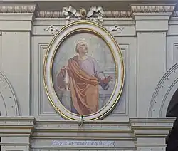 Medailón svatého Abundia na kostele Santi Michele e Magno v Římě