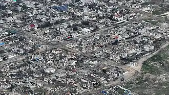 Zničené budovy ve městě