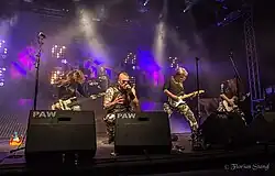 Členové Sabaton vystupující v hale v roce 2012